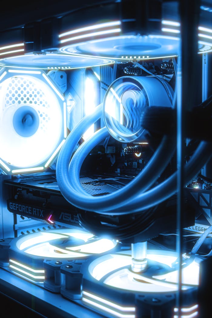 Crafting Captivating Headlines: Your awesome post title goes here Close-up of an illuminated gaming PC showcasing advanced cooling systems and vibrant LED lights.